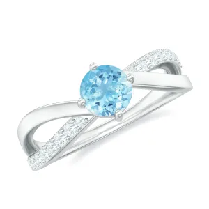 1/2 CT Aquamarine Solitaire and Diamond Infinity Ring