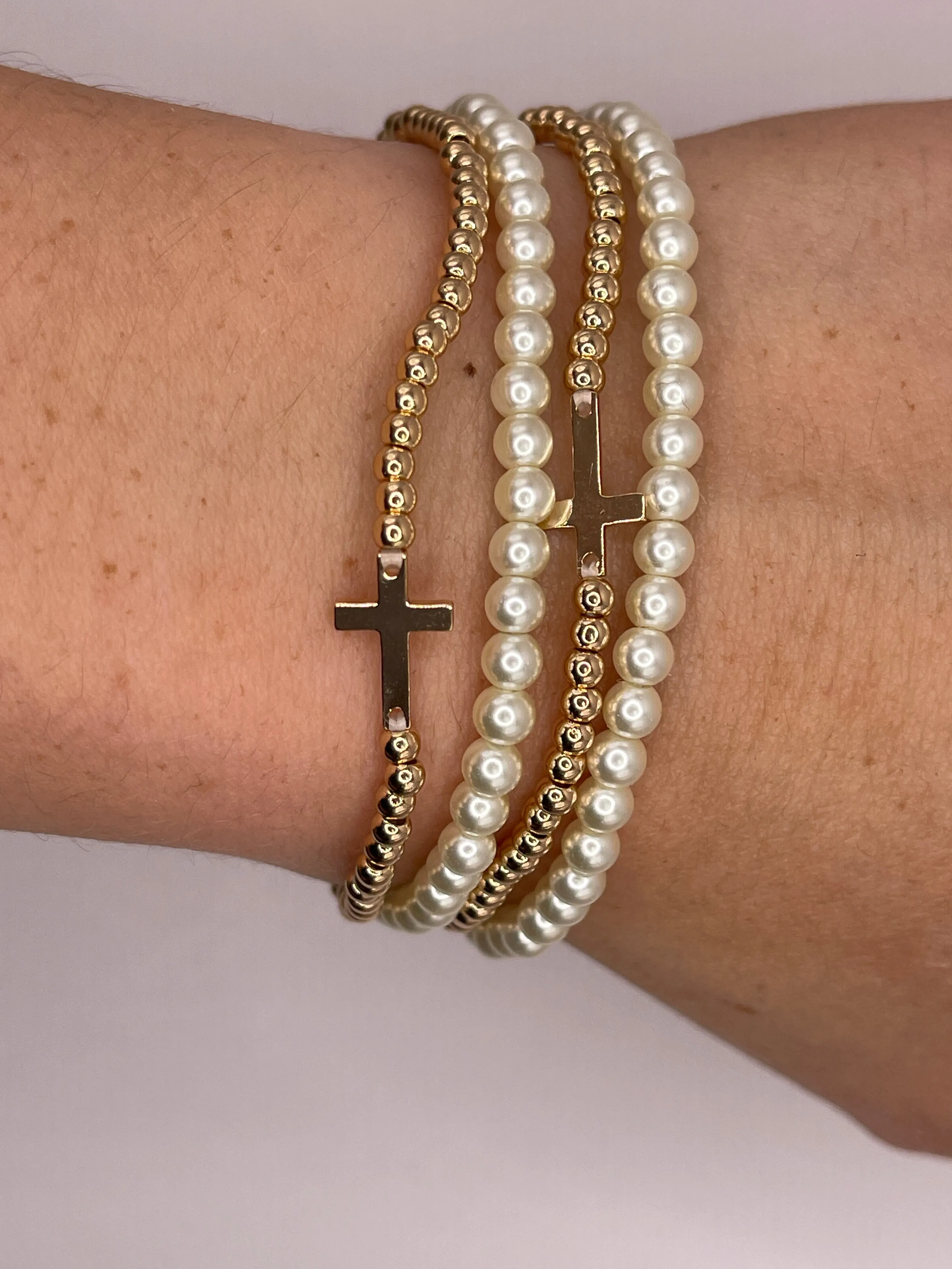 Cross Charm and Pearl Bracelet