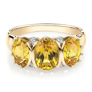 Dress ring with citrine and diamond simulants in 10 carat yellow gold