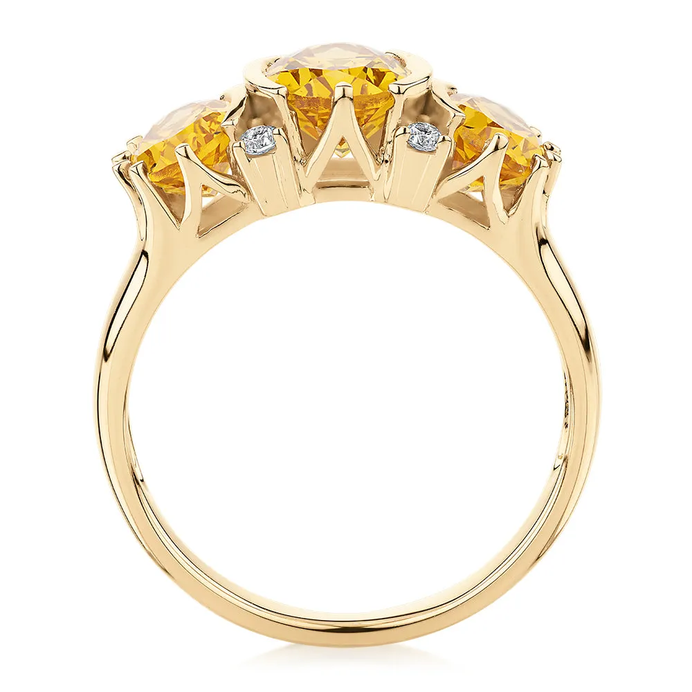 Dress ring with citrine and diamond simulants in 10 carat yellow gold