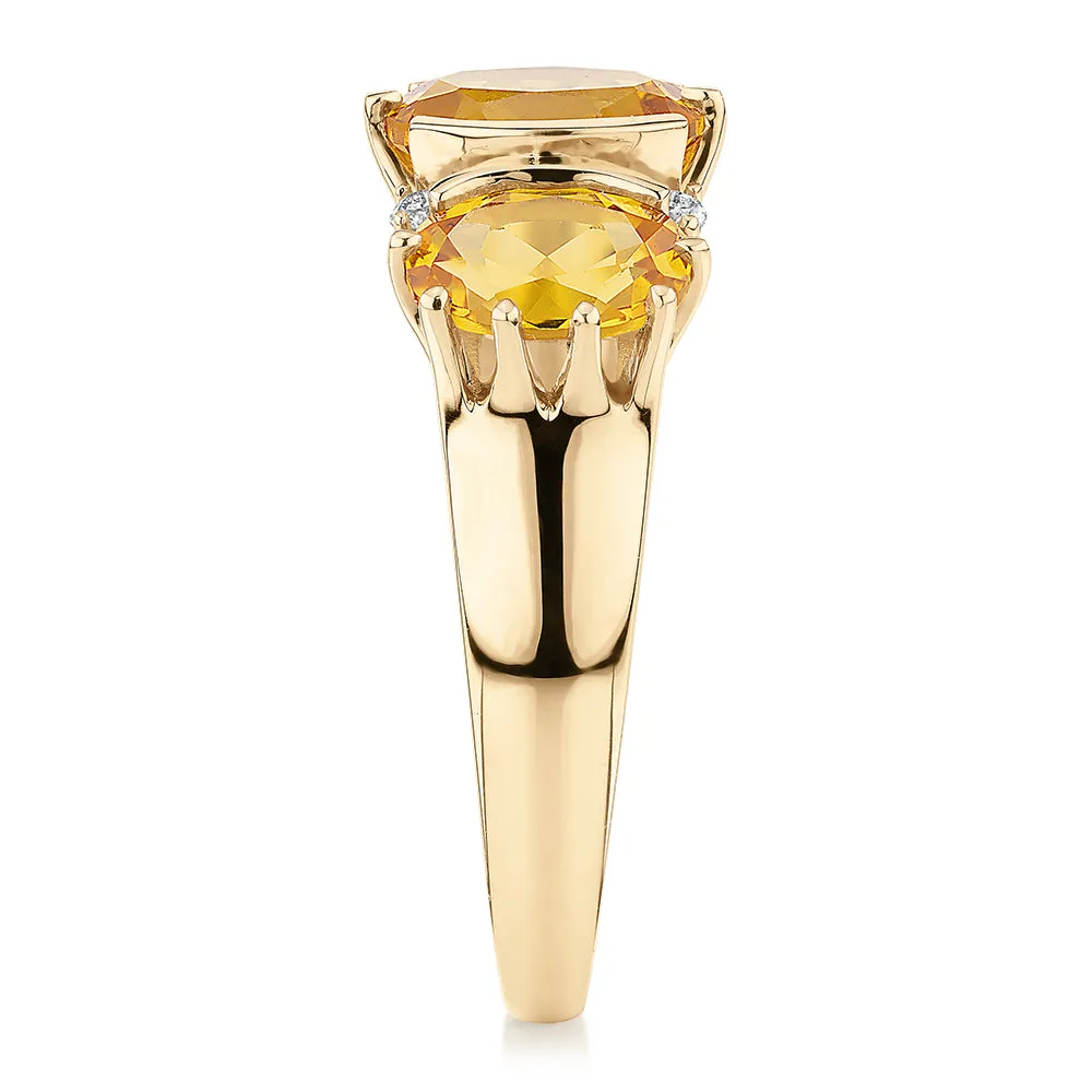 Dress ring with citrine and diamond simulants in 10 carat yellow gold