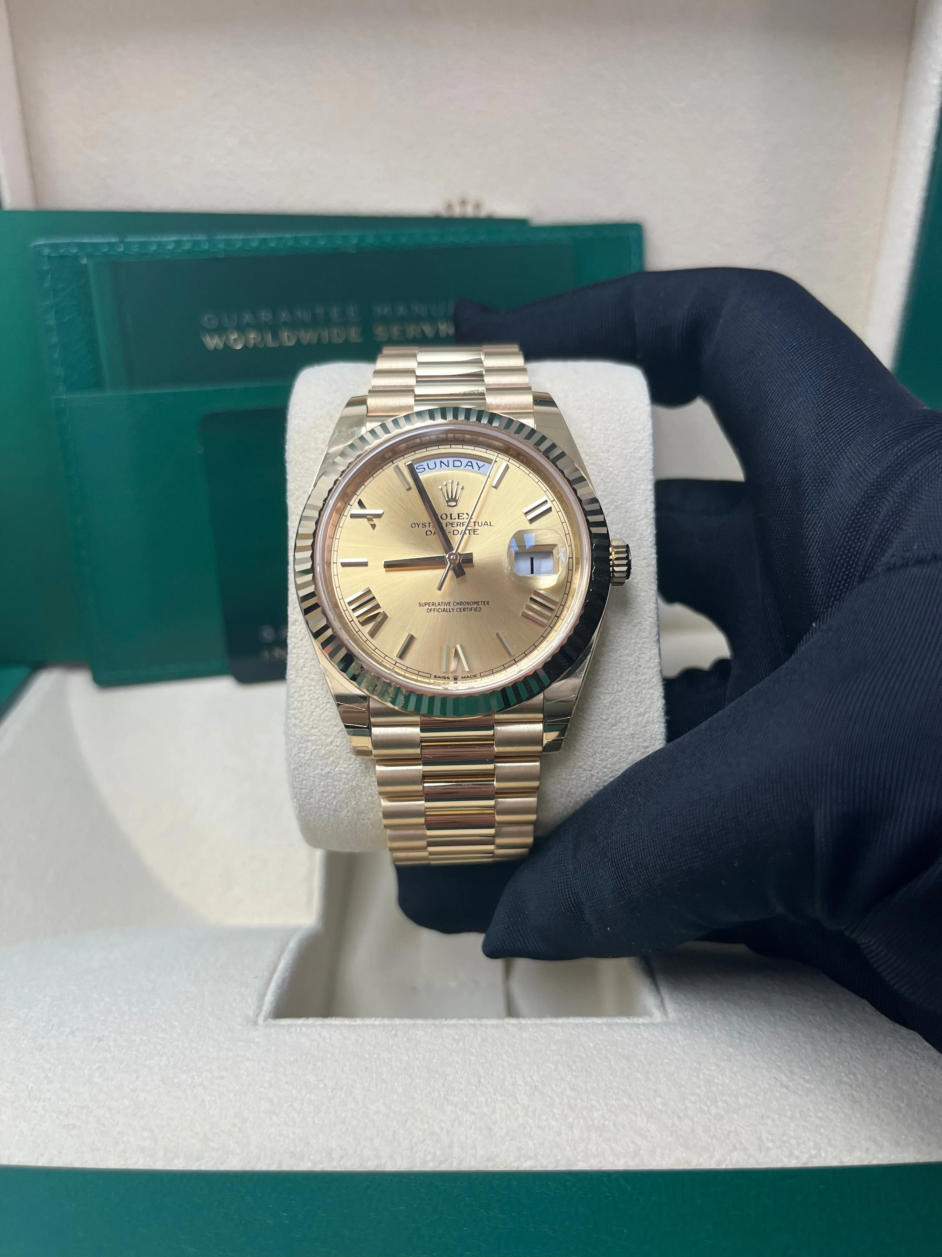 Rolex Day-Date 40 Yellow Gold Champagne Roman Dial Fluted Bezel (Ref # 228238)