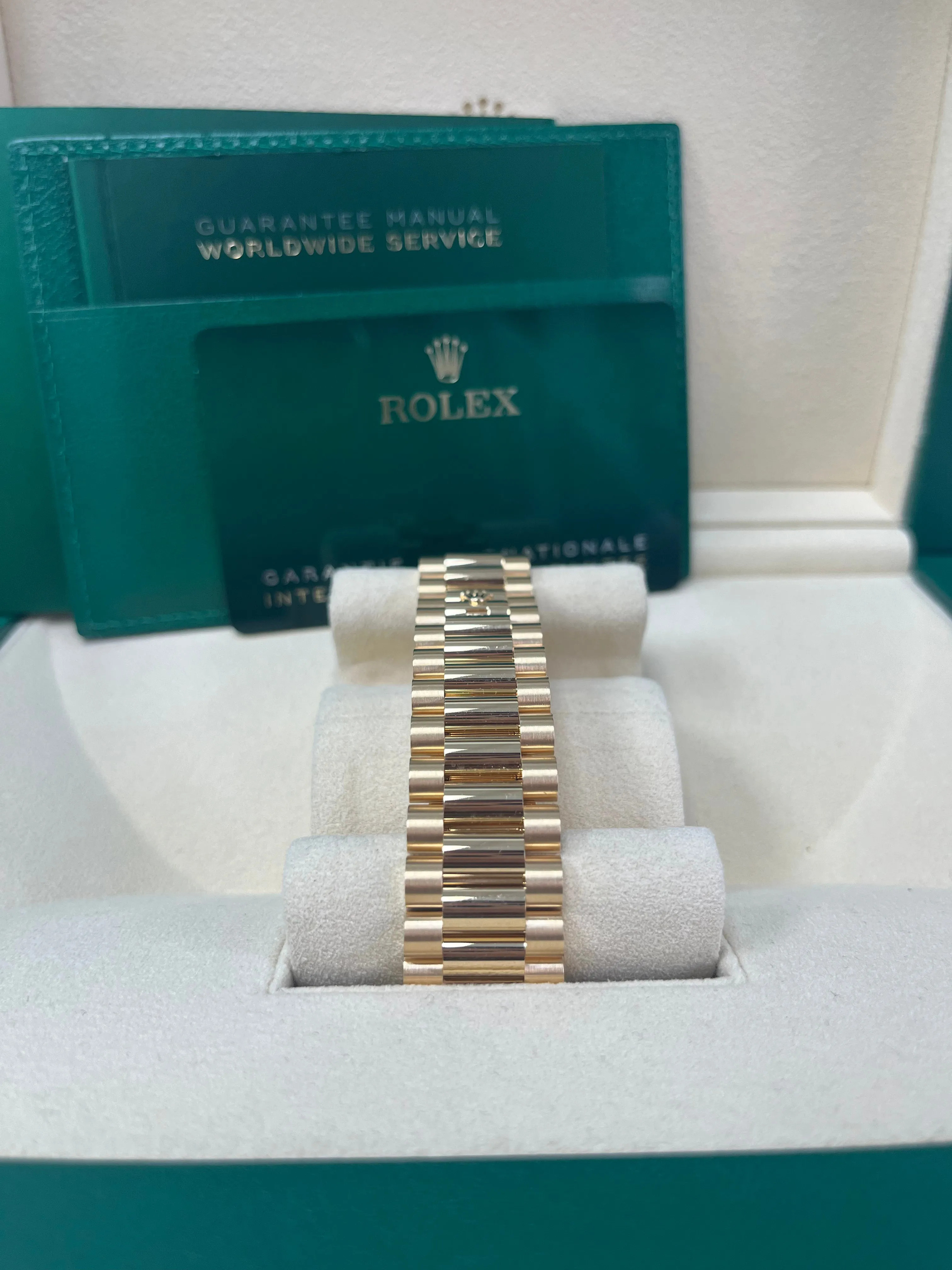 Rolex Day-Date 40 Yellow Gold Champagne Roman Dial Fluted Bezel (Ref # 228238)