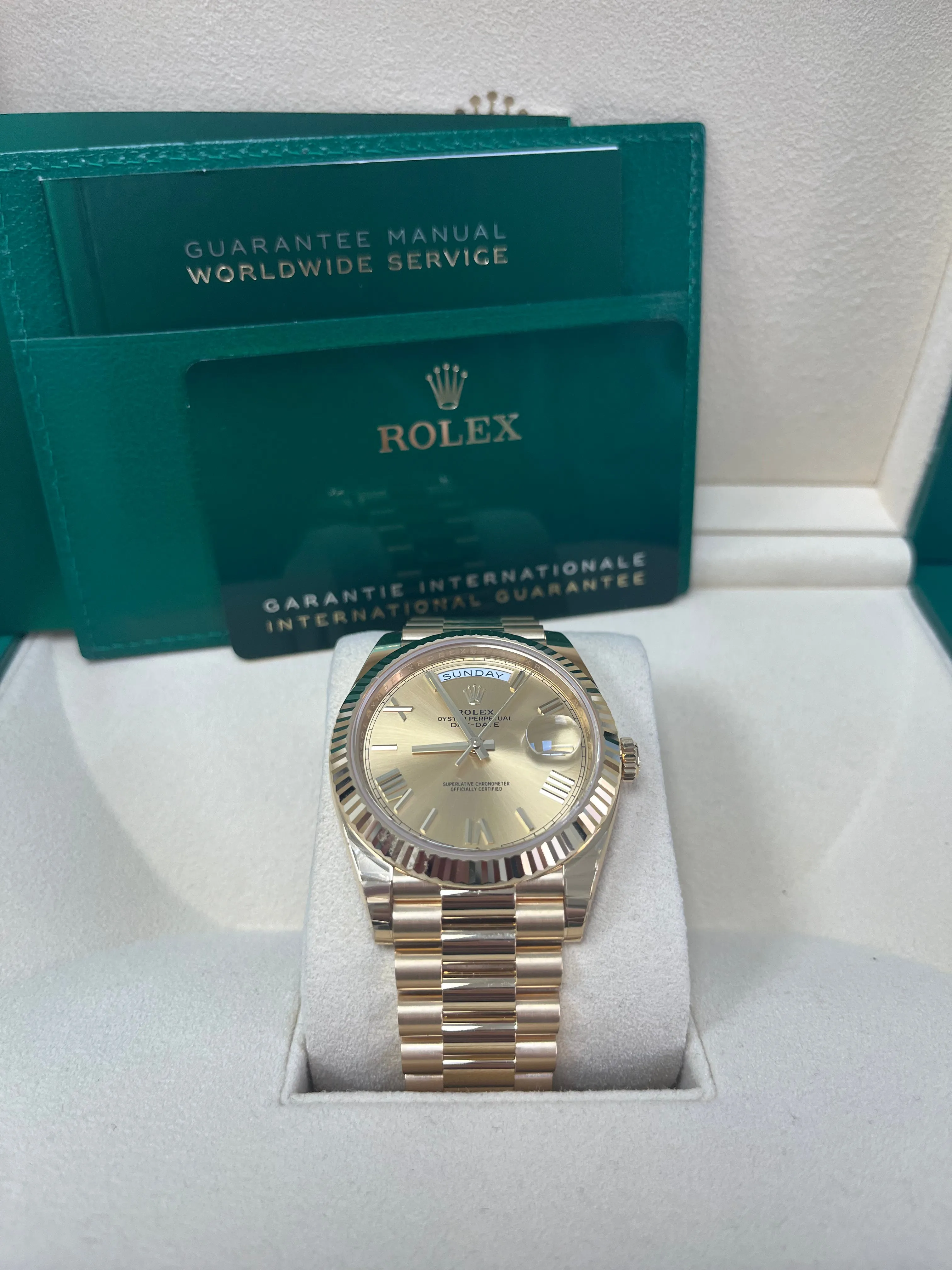 Rolex Day-Date 40 Yellow Gold Champagne Roman Dial Fluted Bezel (Ref # 228238)